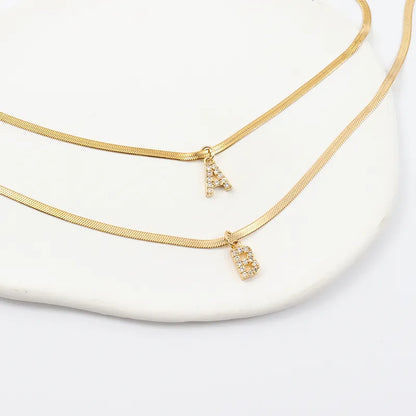 Melly Initial Herringbone Necklace check